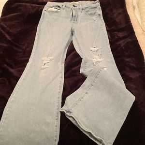 Levi Ripped Flare Jean . Girl size 28.